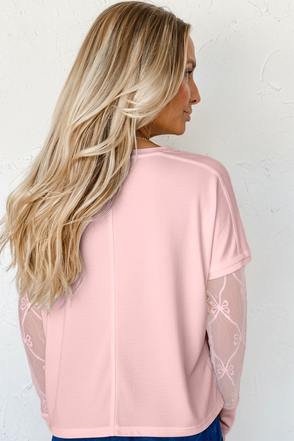 Detail Adds Charm Bow Textured Top