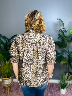 Fierce Beauty Ruffle Neck Top