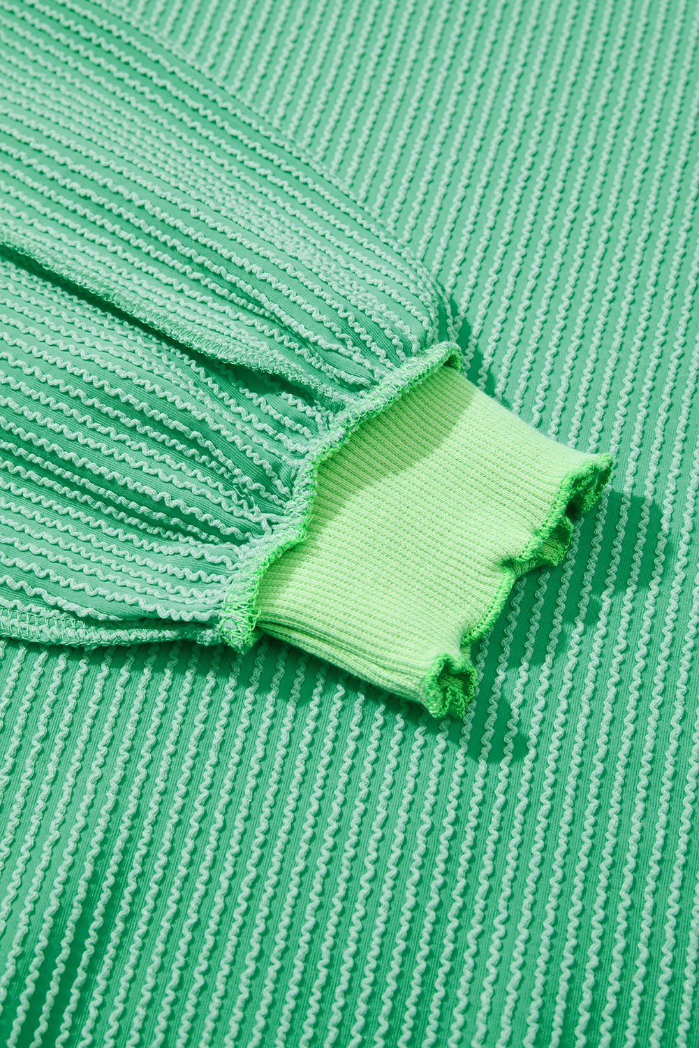 Style Lives On Ribbed Uneven Knit Top