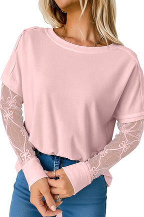 Detail Adds Charm Bow Textured Top