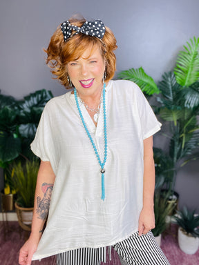 Living The Dream Cream Flowy Top