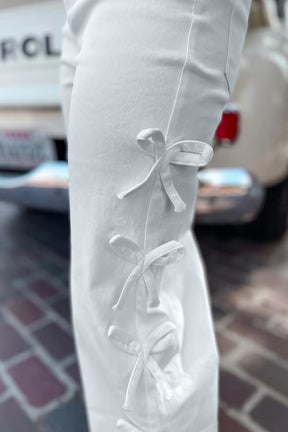 Details Are In The Bow White Jeans