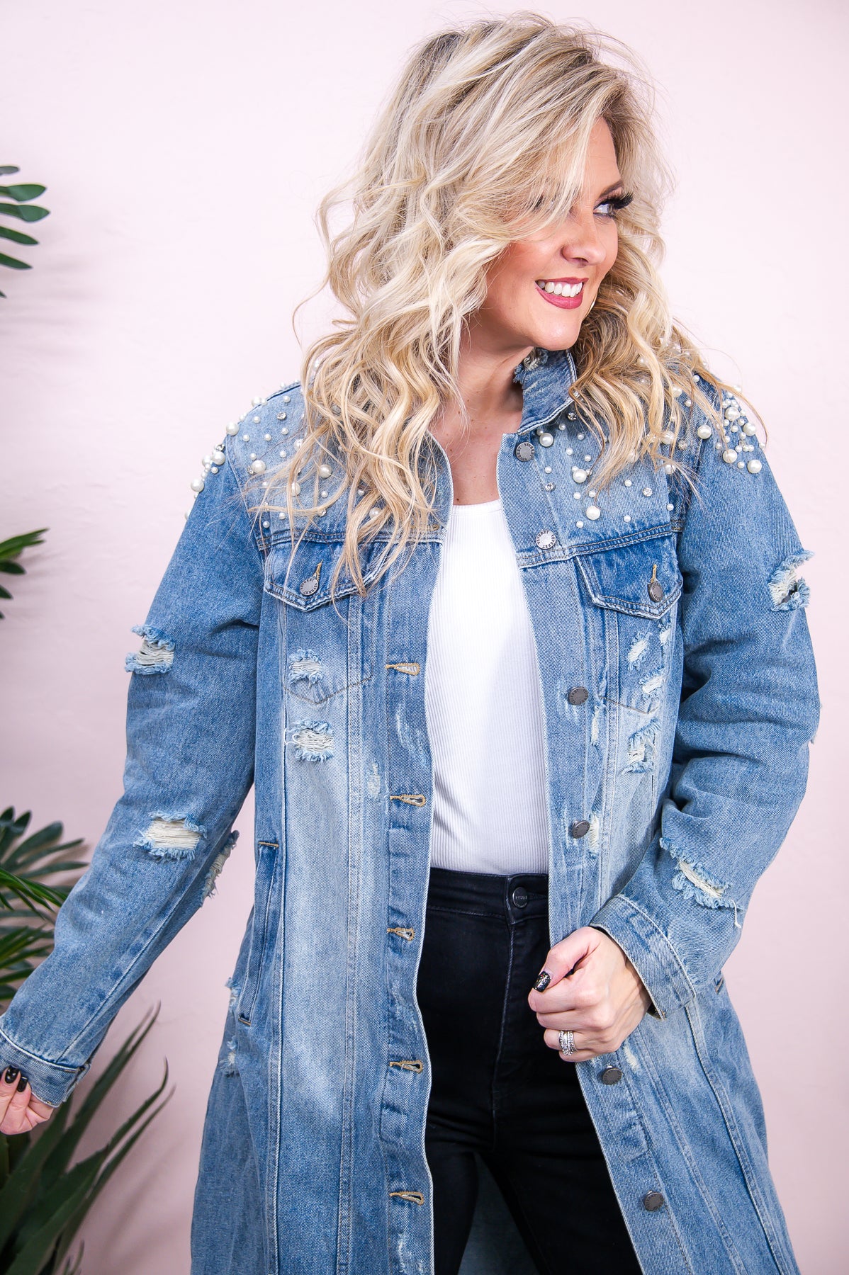 Woman With Long Hair in Denim Jacket and Ripped Denim Jeans · Free Stock  Photo