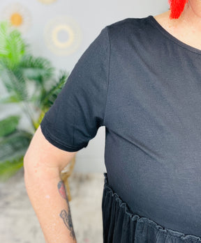 A Shot In The Dark Black Ruffle Hem Top - T11040BK