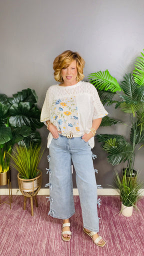 Details Are In The Bow Jeans